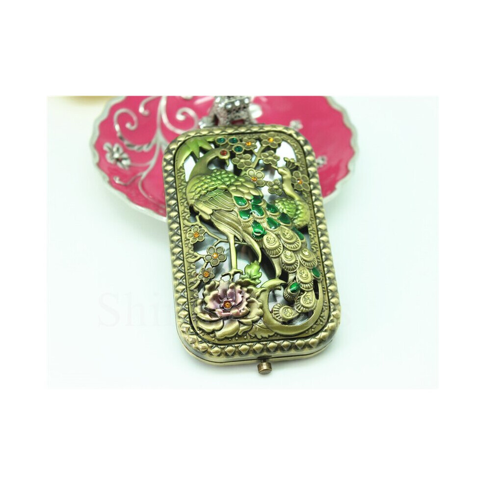 handle-mirror-metal-peacock-handbag-mirror-double-side-mirror.jpg